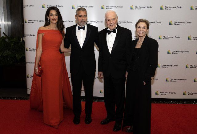From left to right: Amal Clooney, George Clooney, Nick Clooney and Nina Clooney arrive for the formal Artist\