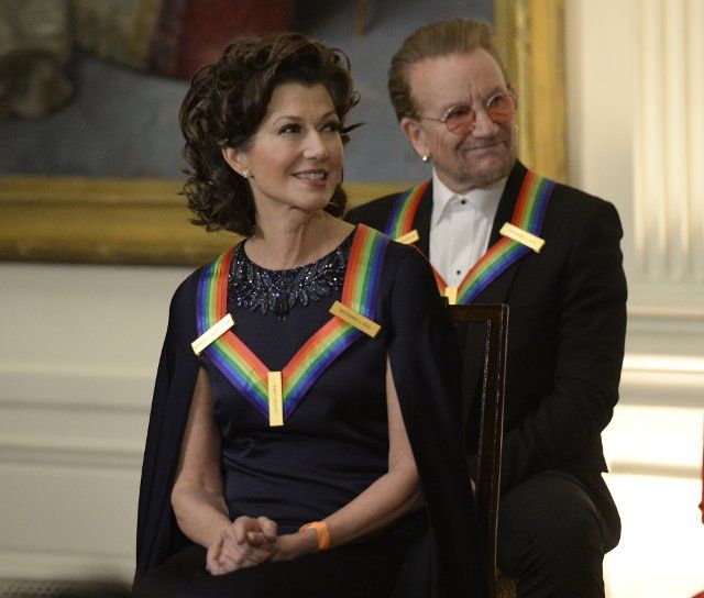 Amy Grant and Bono attend a reception for Kennedy Center Honorees hosted by President Joe Biden and First Lady Jill Biden in the East Room of the White House in Washington, DC on Sunday, December 4, 2022. The Honorees are George Clooney, Singer Gladys Knight, singer-songwriter Amy Grant, Knight, composer Tania Leon, and Irish rock band U2, comprised of band members Bono, The Edge, Adam Clayton, and Larry Mullen Jr. Photo by Bonnie Cash
