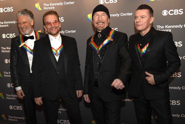 2022 Kennedy Center Honorees Irish rock band U2 members (L-R) Adam Clayton, Bono, the Edge and Larry Mullen,Jr. pose for photographers as they arrive for a gala evening in Washington, Sunday, December 4, 2022. The Honors are awarded for a lifetime achievement in the arts and culture. Photo by Mike Theiler