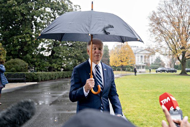 US President Joe Biden arrives to speak to members of the media before boarding Marine One on the South Lawn of the White House in Washington, DC on Tuesday, December 6, 2022. Biden will help celebrate a landmark step in Taiwan Semiconductor Manufacturing Co.\