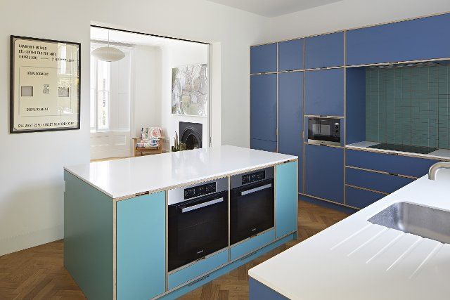 Kitchen interior with island. Queens House, London, United Kingdom. Architect: Paul Archer Design - Architects & Design, 2021