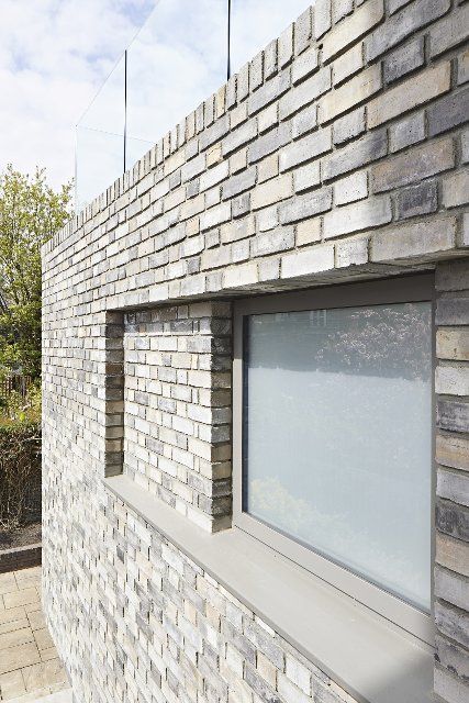 Brick detail with window recess. Queens House, London, United Kingdom. Architect: Paul Archer Design - Architects & Design, 2021
