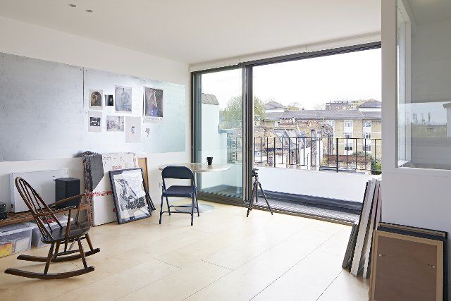 Studio and top floor balcony. Queens House, London, United Kingdom. Architect: Paul Archer Design - Architects & Design, 2021
