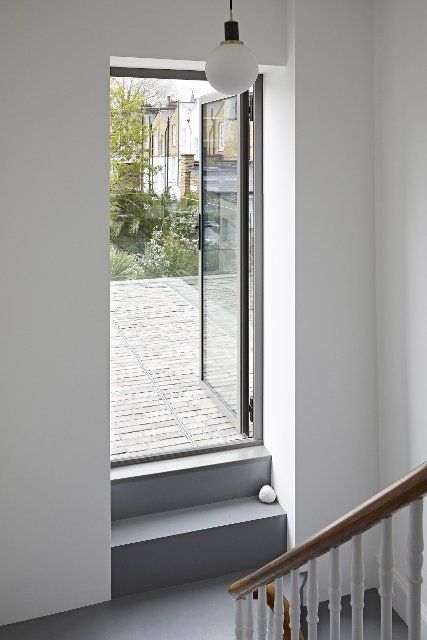 Access to new roof terrace balcony. Queens House, London, United Kingdom. Architect: Paul Archer Design - Architects & Design, 2021