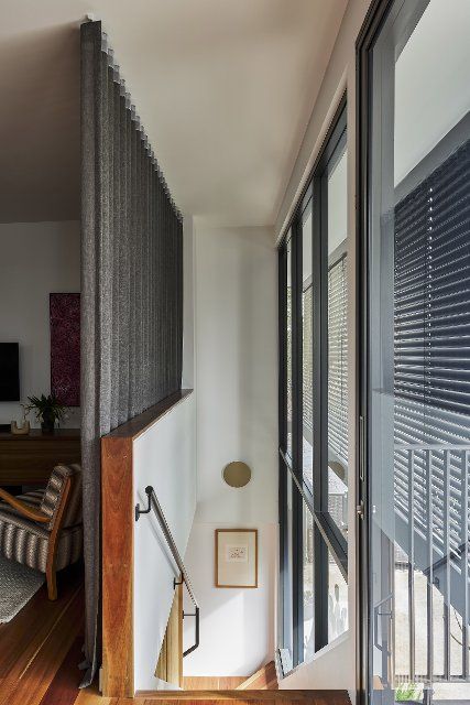 Staircase with outdoor blinds. Birchgrove House, Sydney, Australia. Architect: TW Architects, 2021