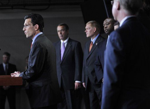 (101118) -- WASHINGTON Nov. 18 2010 (Xinhua) -- U.S. House Majority Leader-elect Republican Eric Cantor (1st L) speaks while House Speaker-elect Republican John Boehner (2nd L) listens during a news conference with fellow GOP House leaders on ...