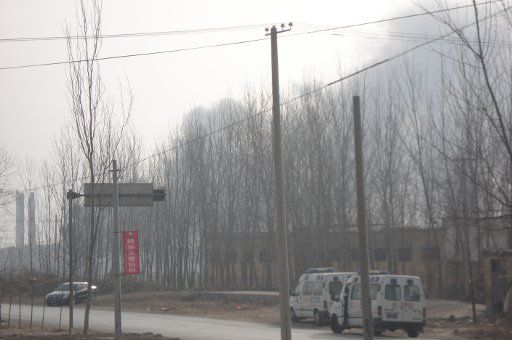 (101208) -- LIAOCHENG Dec. 8 2010 (Xinhua) -- Ambulances head for the Zhongshi Chemicals Co. Ltd. plant where an explosion occurred in Yanggu County east China\