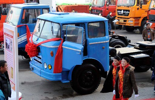 (101208) -- JINAN Dec. 8 2010 (Xinhua) -- Photo taken on Dec. 8 2010 shows a JN150 heavy duty truck on a ceremony celebrating the 50th anniversary of the first heavy duty truck in China JN150 rolled off the assembly line in Jinan capital of ...
