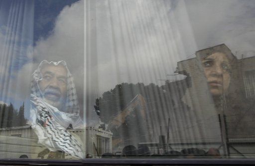 (110109) -- JERUSALEM Jan. 9 2011 (Xinhua) -- A reflection of the Shepherd Hotel is seen on a window of a passing bus in the east Jerusalem neighborhood of Sheik Jarrah Jan. 9 2011. Bulldozers demolished the hotel in an Arab east Jerusalem ...