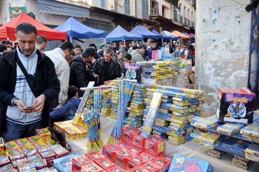 (110211) -- ALGIERS Feb. 11 2011 (Xinhua) -- Algerian Muslims buy fireworks in preparation for celebrating Eid Milad-un-Nabi marking the anniversary of the birth of Prophet Mohammed in Algiers Algeria Feb. 11 2011. (Xinhua\/Mohamed Kadri) (cl)