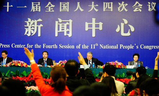 (110308) -- BEIJING March 8 2011 (xinhua) -- Chinese minister of civil affairs Li Liguo (2nd R) vice minister of civil affairs Jiangli (R) and vice minister of civil affairs Dou Yupei (2nd L) attend a press conference of the Fourth Session of the ...