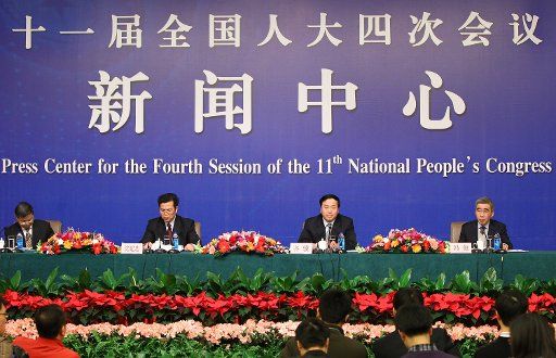 (110309) -- BEIJING March 9 2011 (xinhua) -- Qi Ji (2nd Right) vice minister of House and Urban-Rural Construction Shen Jianzhong (2nd Left) director of Real Estate Market Supervision Department and Feng Jun (R) director of Indemnificatory ...