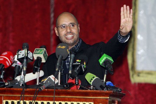 (110311) -- TRIPOLI March 11 2011 (Xinhua) -- Saif al-Islam Gaddafi son of Libyan leader Muammar Gaddafi delivers a speech during a youth rally in Tripoli capital of Libya March 10 2011. (Xinhua\/Hamza Turkia) (