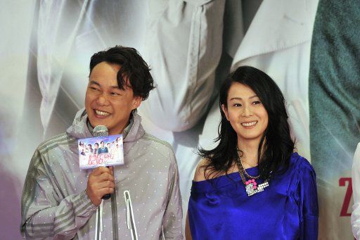 (110405) -- BEIJING April 5 2011 (Xinhua) -- Pop stars Eason Chan (L) and Rene Liu attend the premiere of the romance movie "Mr&Mrs Single" in Beijing capital of China April 5 2011. The film starring Eason Chan and Rene Liu is due to hit the ...