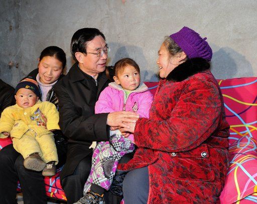 (110321) -- CHONGQING March 21 2011 (Xinhua) -- He Guoqiang (3rd R) a member of the Standing Committee of the Political Bureau of the Communist Party of China (CPC) Central Committee and secretary of the CPC Central Commission for Discipline ...