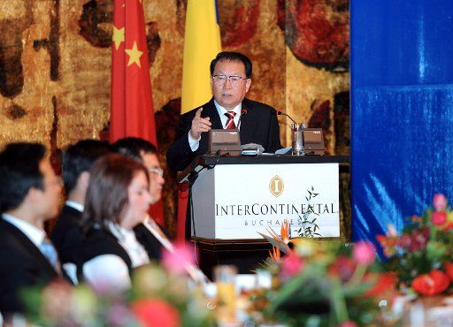 (110415) -- BUCHAREST April 15 2011 (Xinhua) -- Li Changchun (1st R) a member of the Standing Committee of the Political Bureau of the Communist Party of China (CPC) Central Committee attends a breakfast banquet with entrepreneurs of China and ...