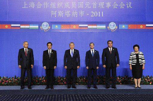 (110615) -- ASTANA June 15 2011 (Xinhua) -- Chinese President Hu Jintao (2nd L) takes a group photo with other leaders attending the summit of the Shanghai Cooperation Organization (SCO) in Astana Kazakhstan June 15 2011. Hu Jintao attended the ...