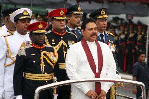 (110527) -- COLOMBO May 27 2011 (Xinhua) -- Sri Lankan President Mahinda Rajapaksa (R Front) inspects the "Victory Day" parade marking the second anniversary of the ending of the civil war in Colombo capital of Sri Lanka May 27 2011. (Xinhua\/...