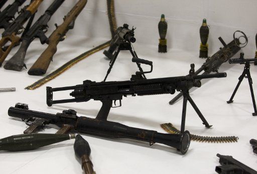 (110604) -- MEXICO CITY June 4 2011 (Xinhua) -- Munitions that allegedly belongs to the "Zetas" criminal group are presented in Mexico City Mexico June 3 2011. The arsenal contains 154 rifles seven handguns rocket launcher two rockets over ...