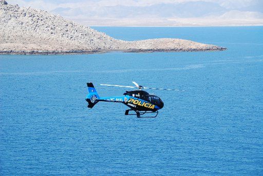 (110705) -- SAN FELIPE July 5 2011 (Xinhua) -- A helicopter of the local police department participates in the second search for possible survivors of the ship capsizing off Bajia U.S. state of California on July 5 2011. The sport fishing ...