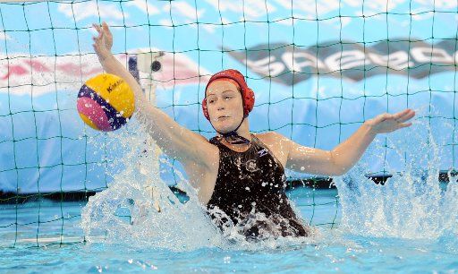 (110719) -- SHANGHAI July 19 2011 (Xinhua) -- Marissa Janssens of Canada saves a shot in the preliminary round of women\
