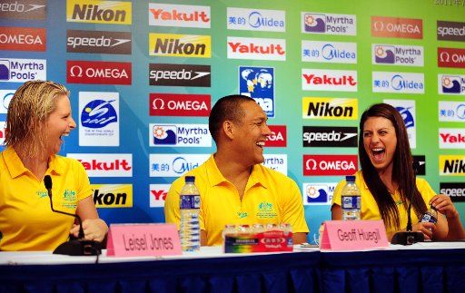 (110722) -- SHANGHAI July 22 2011 (Xinhua) -- Leisel Jones Geoff Huegill and Stephanie Rice (from L to R) of Australia attend a press conference given by members of the Australian swimming team during the 14th FINA World Championships in Shanghai...