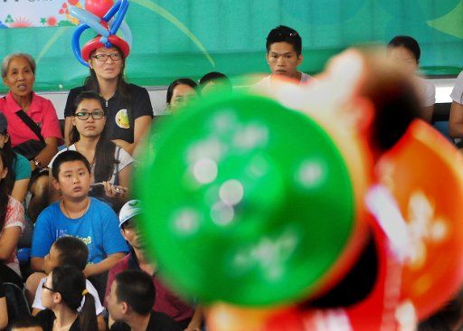 (110819) -- SHENZHEN Aug. 19 2011 (Xinhua) -- Spectators watch weightlifting match in the Complex Training Hall of shenzhen Sport School at the 26th Summer Universiade in Shenzhen a city of south China\