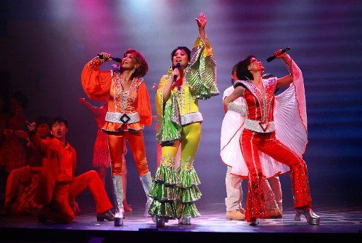 (110815) -- BEIJING Aug. 15 2011 (Xinhua) -- Actresses perform in musical "Mamma Mia!" in Beijing capital of China Aug. 14 2011. The Chinese version of classic musical "Mamma Mia!" was set to start a long run in Beijing with 80 performances ...
