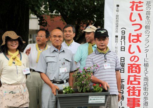 (110911) -- MINAMI SOUMASHI Sept. 11 2011 (Xinhua) -- Sakurai Katsunobu(L3) mayor of Minami Soumashi attends the traditional "Souma Namaoi" in the city of Minami Soumashi Fukushima prefecture on Sept. 11 2011 to commemorate the victims of the ...