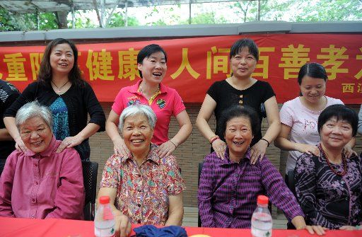 (110928) -- HANGZHOU Sept. 28 2011 (Xinhua) -- Aged women attend activities to celebrate the upcoming traditional Chinese Double Ninth Festival in Hangzhou capital of east China\