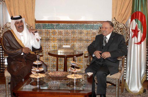 (110928) -- ALGIERS Sept. 28 2011 (Xinhua) -- Algerian President Abdelaziz Bouteflika (R) meets with Sheikh Hamad bin Jassim bin Jabr Al-Thani Qatar\