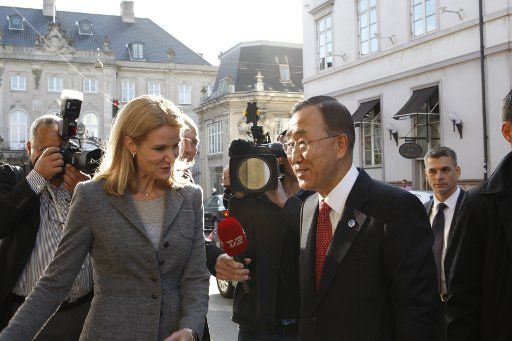 (111011) -- COPENHAGEN Oct. 11 2011 (Xinhua) -- Danish Prime Minister Helle Thorning-Schmidt (L) speaks to UN Secretary-General Ban Ki-moon before the opening conference of the Global Green Growth Forum in Copenhagen on Oct. 11 2011. The Global ...