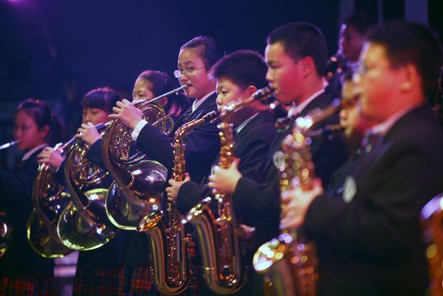 (121201) -- HANGZHOU, Dec. 1, 2012 (Xinhua) -- A children orchestra perform at the closing ceremony of 2012 art festival for primary and secondary school students in Hangzhou, capital of east China\