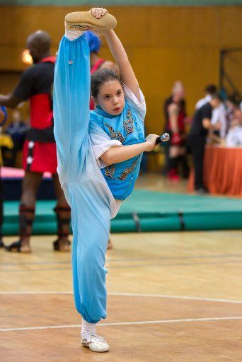 (121125) -- BUDAPEST, Nov. 25, 2012 (Xinhua) -- A girl competes in the 3rd International Chan Wu Traditional Kung Fu and Modern Wu Shu Championships in Budapest, Hungary, on Nov. 24, 2012. (Xinhua\/Attila Volgyi)