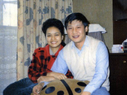 TO MATCH:Profile: Xi Jinping: Man of the people, statesman of vision (121223) -- BEIJING, Dec. 23, 2012 (Xinhua) -- File photo taken in September 1989 shows Xi Jinping and his wife Peng Liyuan. (Xinhua)