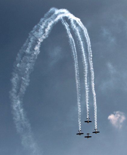 (130206) -- BANGALORE, Feb. 6, 2013 (Xinhua) -- An aerobatic display team from the Czech Republic perform during the opening of the Aero India 2013 at Yelahanka air base in Bangalore, India, Feb. 6, 2013. More than 600 aviation companies and ...