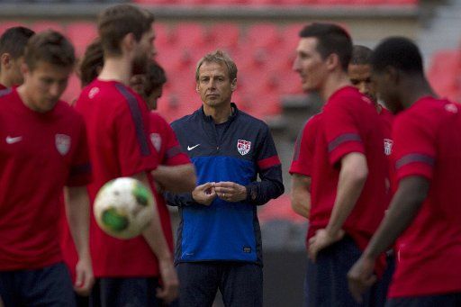 (130326) -- MEXICO CITY, March 26, 2013 (Xinhua) -- U.S. soccer national team coach Jurgen Klinsmann (C) takes part in a training session in Azteca Stadium, in Mexico City, capital of Mexico, on March 25, 2013. U.S. national team will face Mexico ...