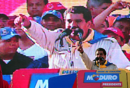 (130411) -- FALCON, April 11, 2013 (Xinhua) -- Venezuelan acting president and presidential candidate Nicolas Maduro attends a campaign rally at Falcon State, Venezuela, on April 10, 2013. Venezuela will hold presidential elections on April 14. (...