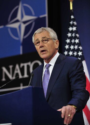 (130605) -- BRUSSELS, June 5, 2013 (Xinhua) -- United States Secretary of Defense Chuck Hagel addresses a press conference after two-days NATO Defence Ministers Meeting at its headquarters in Brussels, capital of Belgium, June 5, 2013. (Xinhua\/Ye ...