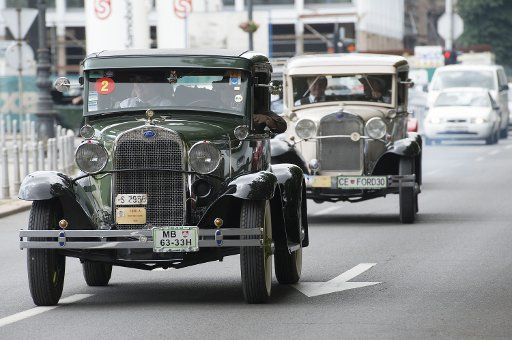 (130608) -- ZAGREB, June 8, 2013 (Xinhua) -- Participants from Slovenia drive their vintage cars during the 28th Zagreb Oldtimer Rally in Zagreb, Croatia, June 8, 2013. More than one hundred vintage cars and motorcycles took part in a traditional ...