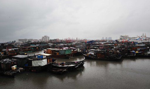(130702) -- BEIHAI, July 2, 2013 (Xinhua) -- Fishing boats are berthed in a harbor in Beihai, south China\