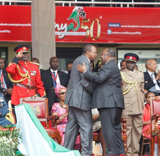 (131212) -- NAIROBI, Dec. 12, 2013 (Xinhua) -- Ali Bongo Ondimba (front R), President of Gabon, hugs Kenya\