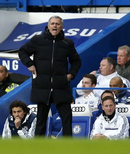 (140127) -- LONDON, Jan. 27, 2014 (Xinhua) -- Jose Mourinho, manager of Chelsea, gives instructions during FA Cup Fourth Round match against Stoke City at Stamford Bridge Stadium in London, Britain on Jan. 26, 2014. Chelsea won 1-0. (Xinhua\/Wang ...