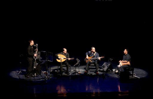 (140219) -- TEHRAN, Feb. 19, 2014 (Xinhua) -- Members of a Tunisian musical band perform traditional songs at a concert during the 29th Fadjr International Music Festival in Tehran, Iran, Feb. 18, 2014. (Xinhua\/Ahmad Halabisaz)(hy)