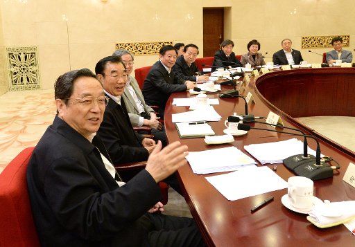 (140320) -- BEIJING, March 20, 2014 (Xinhua) -- Yu Zhengsheng (front), chairman of the National Committee of the Chinese People\