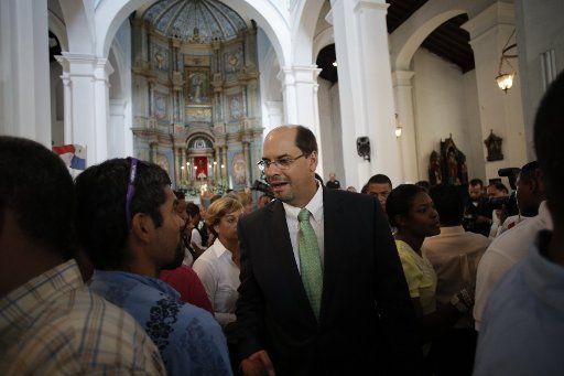 (140503) -- PANAMA CITY, May 3, 2014 (Xinhua) -- Jose Domingo Arias (C), presidential candidate for the Democratic Change Party, leaves the Metropolitan Cathedral after attending a mass in Panama City, capital of Panama, on May 3, 2014. Panamanians ...