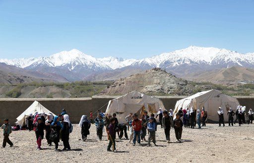(140513) -- BAMYAN, May 13, 2014, 2014 (Xinhua) -- Afghan school students walk after class in a school in Bamyan province in central Afghanistan on May 13, 2014. (Xinhua\/Kamran)