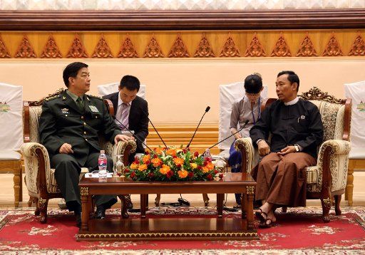 (140520) -- NAY PYI TAW, May 20, 2014 (Xinhua) -- U Shwe Mann (R, front), Speaker of the Union Parliament and the House of Representatives of Myanmar, meets with visiting Chinese State Councilor and Defense Minister Chang Wanquan (L, front) in Nay ...