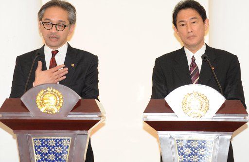 (140812) -- JAKARTA, Aug. 12, 2014 (Xinhua) -- Indonesian Foreign Minister Marty Natalegawa (L) and his Japanese counterpart Fumio Kishida attend a press conference after their meeting in Jakarta, Indonesia, on Aug. 12, 2014. (Xinhua\/Agung Kuncahya ...
