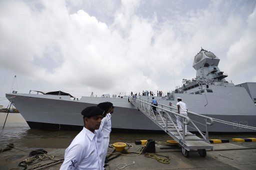 (140813) -- MUMBAI, Aug. 13, 2014 (Xinhua) -- The Indian Naval ship (INS) Kolkata berth at the Naval Dockyard in Mumbai, India, Aug. 13, 2014. The indigenously built warship, INS Kolkata, is the first ship of the Kolkata-class guided missile ...
